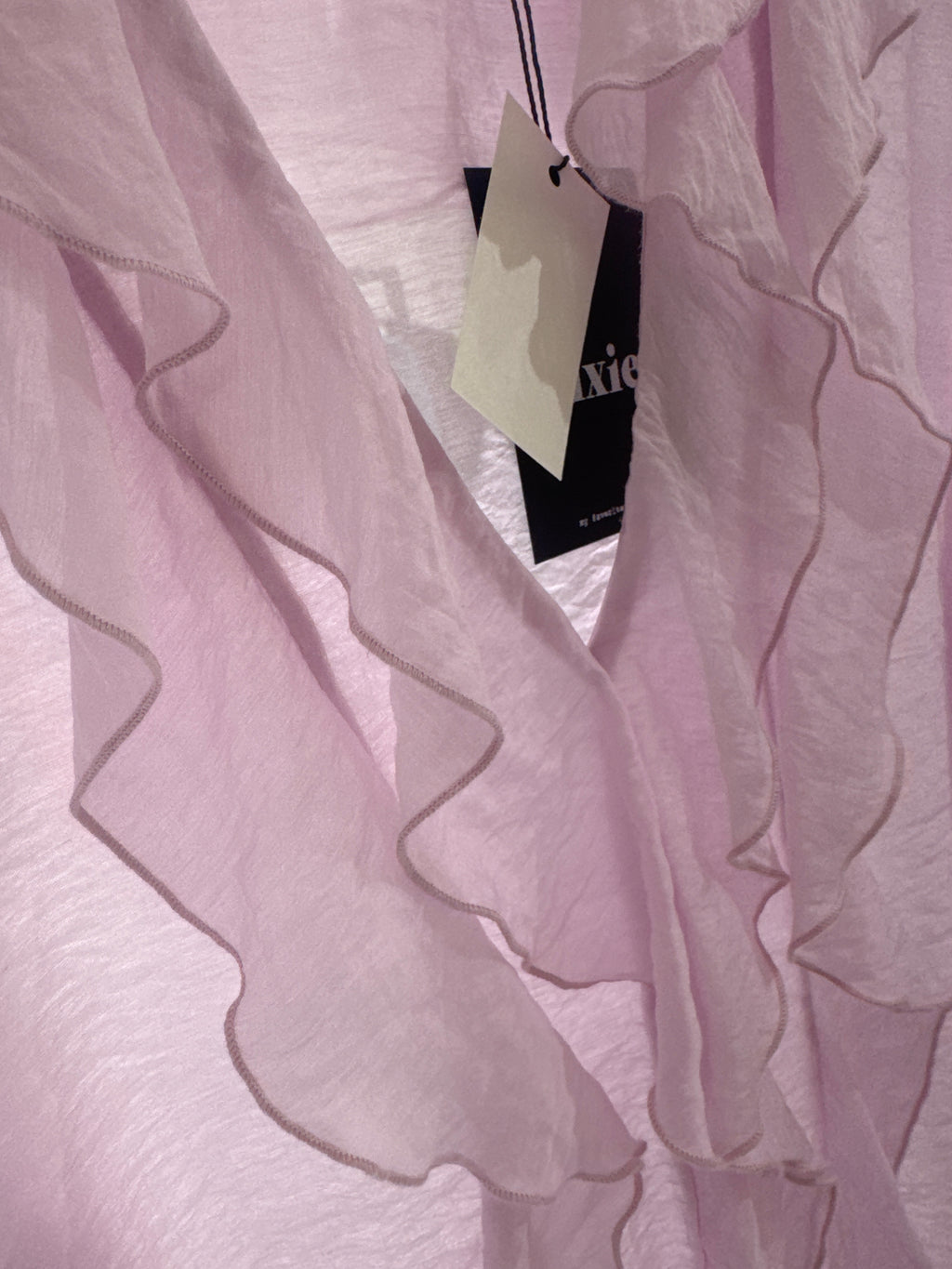 BLUSA CON VOLAN DIXIE